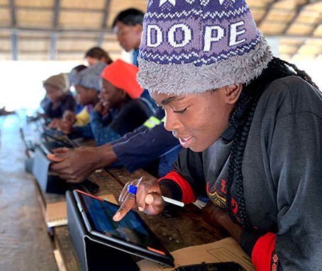 Another photo of farmers playing the game in a playsession in the Zimbabwe project